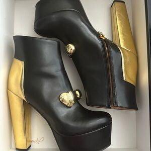 Block Heel Platform boots by Love Moschino